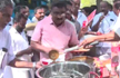 Congress workers distribute Beef curry outside Kerala police station